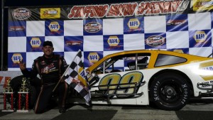 Rowan Pennink celebrates victory in the SK Modified feature Friday at Stafford Speedway (Photo: Jason Cunningham/NASCAR) 