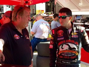 Keith Rocco (right) talks with crew chief Brad Lafontaine after practice Friday at New Hampshire Motor Speedway