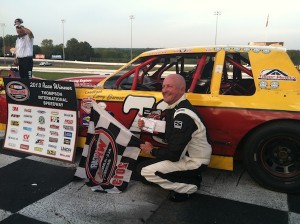 Larry Barnett celebrates his Limited Sportsman victory Thursday at Thompson Speedway 