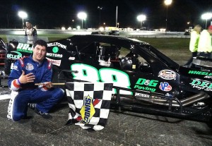 Keith Rocco celebrates an SK Modified victory in 2013 at the Waterford Speedbowl 