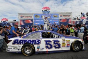 Brian Vickers celebrates a Sprint Cup Series victory at New Hampshire Motor Speedway in July 