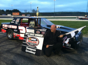 Corey Hutchings celebrates his Limited Sportsman victory Thursday at Thompson Speedway 