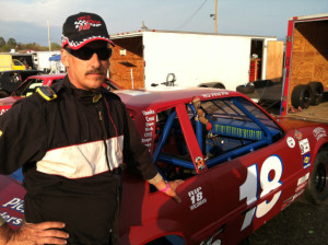 Ed Field with his late brother's car Saturday at the Waterford Speedbowl