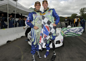 U.S. Marine Staff Sgt. Liam Dwyer (right) and co-driver Tom Long celebrate their victory Saturday at Lime Rock Park (Photo: LAT Photo USA for IMSA) 