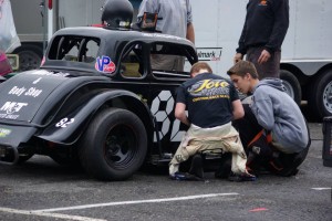 Mike Christopher Jr. (right) works on his Legends car (Photo: Tiesha DiMaggio/Sids Vault Crew)