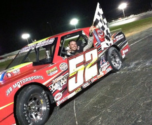 Al Stone III celebrates victory Saturday at the Waterford Speedbowl (Photo: Mark Caise/Waterford Speedbowl)