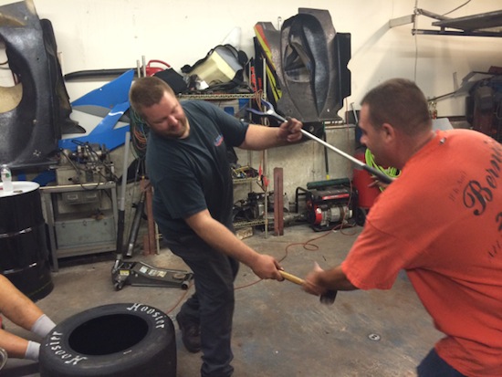 Paul French (left) and Joey Ferrigno go to battle in a  grabber vs. sledgehammer duel.