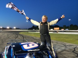 Kerry Malone celebrates his SK Modified victory Thursday at Thompson Speedway. 