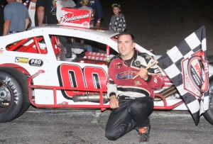 Woody Pitkat celebrates victory in the 2011 Budweiser SK Modified Nationals 150 at the Waterford Speedbowl 