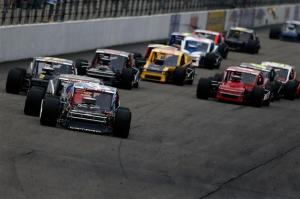 Woody Pitkat leads a pack on track during the Whelen Modified Tour F.W. Webb 100 at New Hampshire Motor Speedway (Photo: Getty Images for NASCAR)