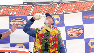 Ryan Preece celebrates victory in the Whelen Modified Tour NAPA Auto Parts Fall Final 150 Sunday at Stafford Speedway (Photo: Getty Images for NASCAR)