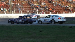 Waterford Speedbowl pace car driver Steve Oloski takes evasive action Sunday to avoid getting rammed by Mini Stock driver Ray Christian III (93). who was coming backwards at him while he was pulling onto the track (Photo: Steve Kennedy/Waterford Speedbowl)
