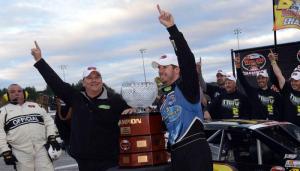 Team owner Mike Smeriglio III (left) celebrates his first Whelen Modified Tour championship with driver Doug Coby in October at Thompson Speedway (Photo: Getty Images for NASCAR)