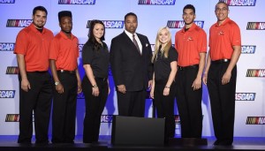 From left, Collin Cabre, Dylan Smith, Kenzie Ruston, Rev Racing CEO Max Siegel, Natalie Decker, Devon Amos and Jay Beasley were part of the 2015 NASCAR Drive for Diversity introduction Monday. (Photo: Getty Images For NASCAR)