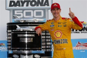 Middletown native Joey Logano poses with the Harley J. Earl Trophy Sunday after winning his first Daytona 500 (Photo: Chris Trotman/Getty Images for NASCAR)
