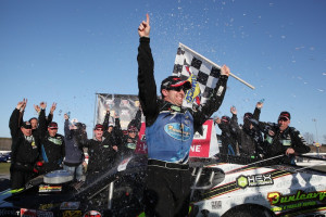 Doug Coby celebrates victory in the Whelen Modified Tour season opening Icebreaker 150 Sunday at Thompson Speedway (Photo: Tim Bradbury/Getty Images for NASCAR)