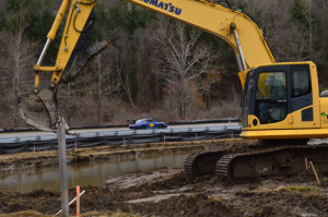 Crews work on a new retention pond behind the newly placed Big Bend inside guardrail at Lime Rock Park (Photo: Lime Rock Park) 
