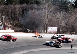 Rowan Pennink's car is in flames after a scary Whelen Modified Tour practice crash Saturday at Thompson Speedway