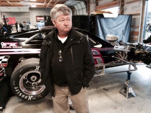 Tony Glover observes as Whelen Modified Tour teams prepare for Icebreaker weekend Friday at Thompson Speedway 