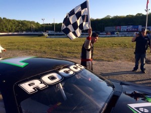 Keith Rocco salutes fans at the New London-Waterford Speedbowl after winning the Late Model feature Saturday and taking sole possession of the top spot on the track's all-time win list  