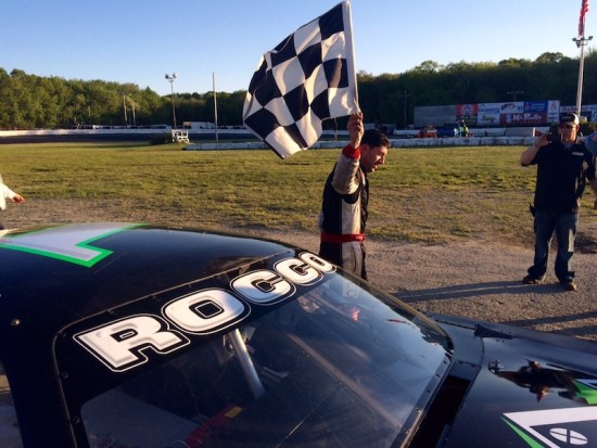 Keith Rocco salutes fans at the New London-Waterford Speedbowl Saturday after winning the Late Model feature and taking sole possession of the top spot on the track's all-time win list
