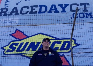 New London-Waterford Speedbowl general manager oversees the track driver's meeting on the backstretch Saturday afternoon 