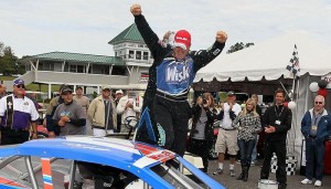 Todd Szegedy celebrates victory at Lime Rock Park in 2011, in the last event for the NASCAR Whelen Modified Tour on a road course (Photo: Jim McIsaac/Getty Images for NASCAR)