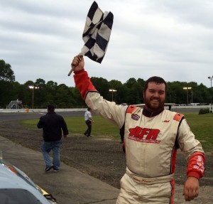 Anthony Flanner celebrates victory in the Late Model division Saturday at the New London-Waterford Speedbowl 
