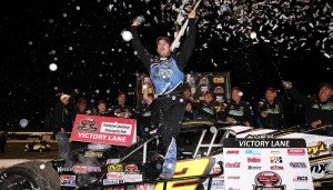 Doug Coby celebrates victory in the Whelen Modified Tour Mr. Rooter 125 June 10 at Thompson Speedway (Photo: Tim Bradbury/Getty Images for NASCAR)