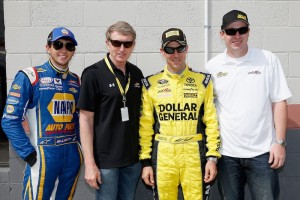 Chase Elliott, driver of the #9 NAPA Auto Parts Chevrolet in the XFINITY Series, and his father, former driver Bill Elliott, pose with Matt Kenseth, driver of the #20 Dollar General Toyota, and his son, Ross Kenseth, on April 18, 2015 in Bristol, Tennessee (Photo: Todd Warshaw/Getty Images for NASCAR)