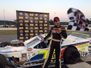 Eric Berndt celebrates winning the Sunoco Modified 20/20 Sprint for the SK Modified division Wednesday at Thompson Speedway