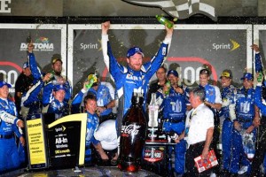Dale Earnhardt Jr. celebrates victory early Monday morning following the Sprint Cup Series Coke Zero 400 at Daytona International Speedway (Photo: Robert Laberge/Getty Images for NASCAR)