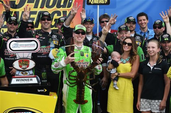 Kyle Busch poses in Victory Lane with "Loudon the Lobster" after winning the Sprint Cup Series 5-Hour Energy 301 at New Hampshire Motor Speedway (Photo: Rainier Ehrhardt/Getty Images for NASCAR)