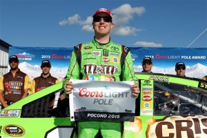 Kyle Busch celebrates winning the pole Friday for Sunday's Sprint Cup Series Windows 10 400 at Pocono Raceway (Photo: Tim Bradbury/Getty Images for NASCAR)