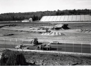 Construction workers survey the backstretch of New Hampshire International Speedway during construction of the racetrack in August of 1989 (Photo: Courtesy of New Hampshire Motor Speedway)