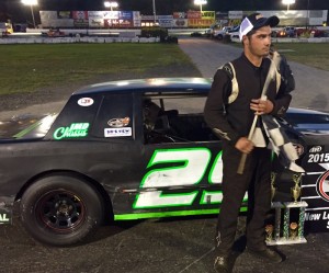 Corey Coates celebrates his first career Limited Sportsman feature Saturday at the New London-Waterford Speedbowl (Photo: Mike Serluca/New London-Waterford Speedbowl)