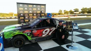 Dave Trudeau celebrates victory in his Mini Stock on Aug. 26 at Thompson Speedway (Photo: Thompson Speedway)