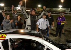 Diego Monahan celebrates victory in the SK Modified feature Saturday at the New London-Waterford Speedbowl 