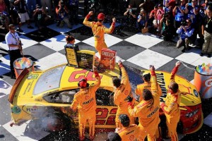 Joey Logano celebrates victory after the Sprint Cup Cheez-It 355 at the Glen at Watkins Glen International Sunday (Photo: Daniel Shirey/Getty Images for NASCAR) 