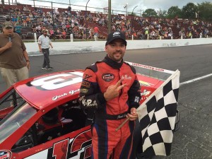 Josh Galvin celebrates an SK Light Modified victory Saturday at the New London-Waterford Speedbowl (Photo: New London-Waterford Speedbowl) 