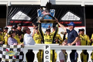 Matt Kenseth celebrates winning the Sprint Cup Series Windows 10 400 at Pocono Raceway Sunday (Photo: Tim Bradbury/Getty Images for NASCAR)