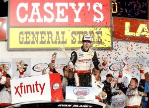 Ryan Blaney celebrates victory in the NASCAR XFINITY Series U.S. Cellular 250 at Iowa Speedway on Saturday (Photo: Brian Lawdermilk/Getty Images for NASCAR)