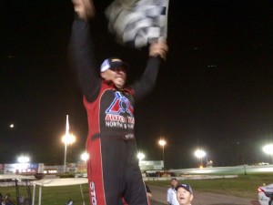 Al Stone III celebrates a win and a championship in the Limited Sportsman division Saturday at the New London-Waterford Speedbowl 