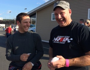Doug Dunleavy (right), owner of Dunleavy's Truck & Trailer Repair, jokes with Whelen Modified Tour driver Justin Bonsignore during an event at Stafford Motor Speedway last year 