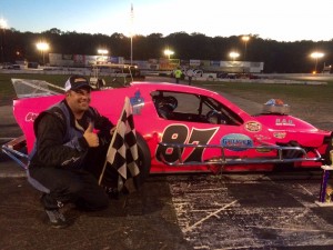 Joey Ferrigno celebrates an SK Light Modified feature win Saturday at the New London-Waterford Speedbowl 