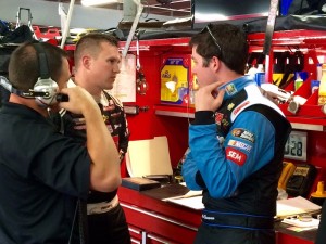 Ryan Preece (middle) talks with Sprint Cup Series driver Alex Bowman (right) following practice for the series Friday at New Hampshire Motor Speedway