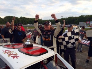 Ron Silk celebrates victory in the Dunleavy Truck & Trailer 100 Sunday at the New London-Waterford Speedbowl 