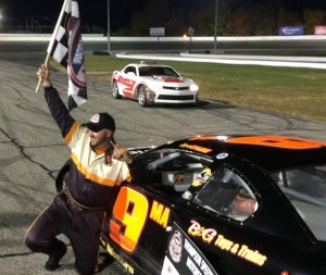 Brian Tagg celebrates his first Late Model championship Friday at Thompson Speedway 