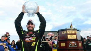 Doug Coby celebrates his second consecutive Whelen Modified Tour championship Sunday at Thompson Speedway (Photo: Billy Weiss/Getty Images for NASCAR)