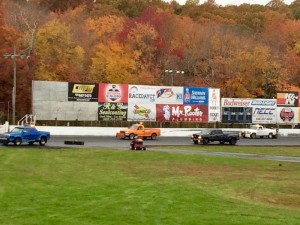 Crews work to dry the racing surface early Sunday afternoon at the New London-Waterford Speedbowl 
